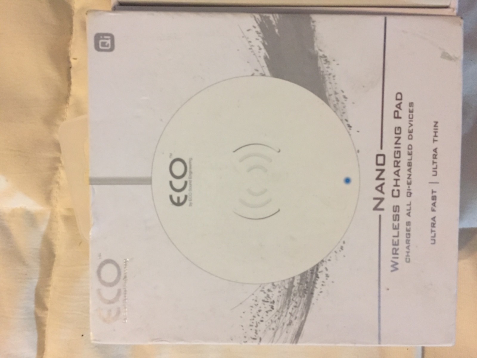 WHITE ECO NANO WIRELESS CHARGING PAD QI-ENABLED DEVICE