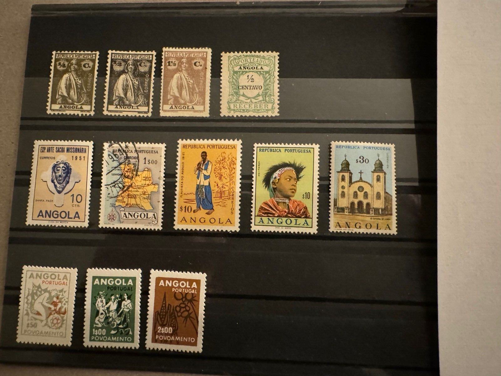 Angola Group of 12 loose stamps Scott Cat 118/RA30 1914-1963