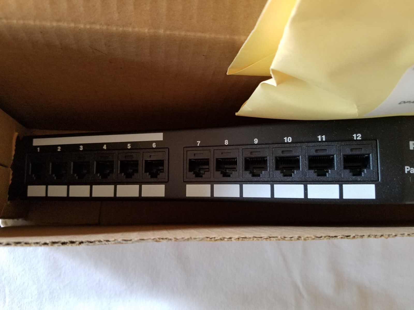 DPA245E88TGY Panduit Category 5e 24-Port Patch Panel Angled 1RU