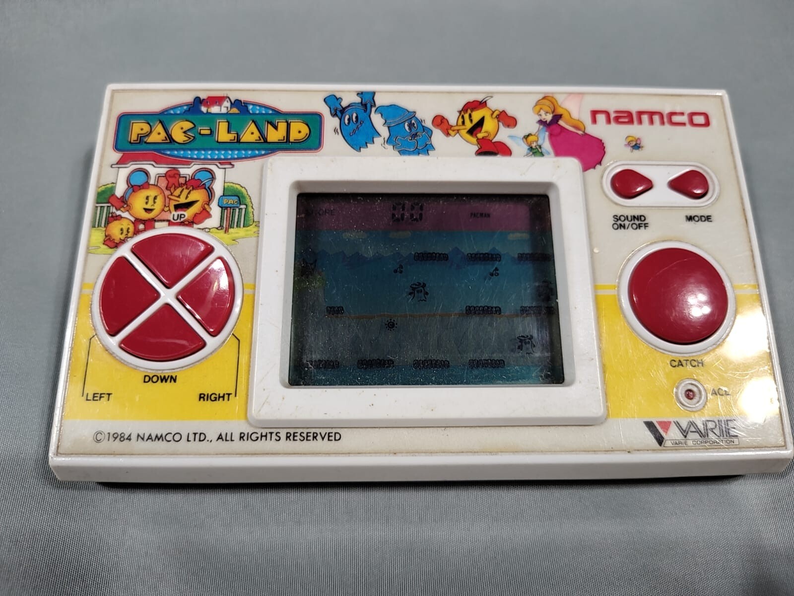 VINTAGE PAC-LAND 1984 (PACMAN) LCD HANDHELD GAME BY NAMCO