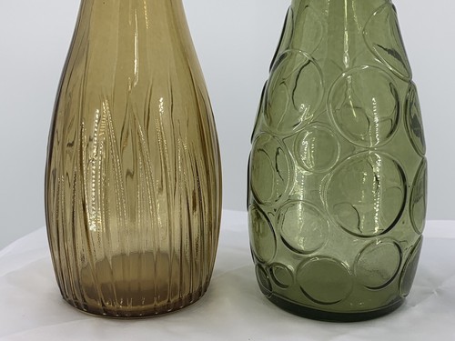 Two Colored Glass Bottles Green and Amber 10” Tall Numbered