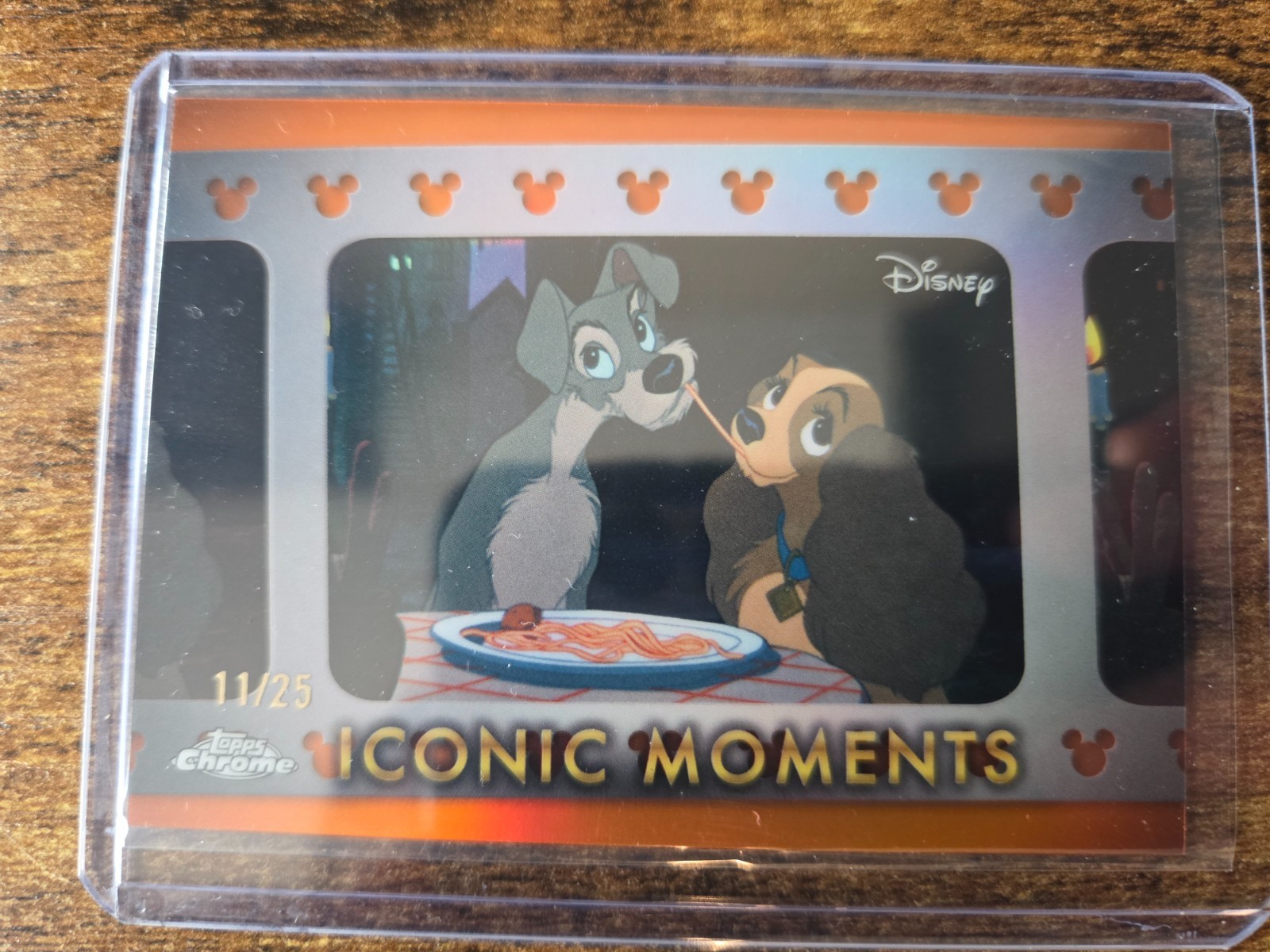 2025 Topps Chrome Disney Lady & Tramp Iconic Moments Orange