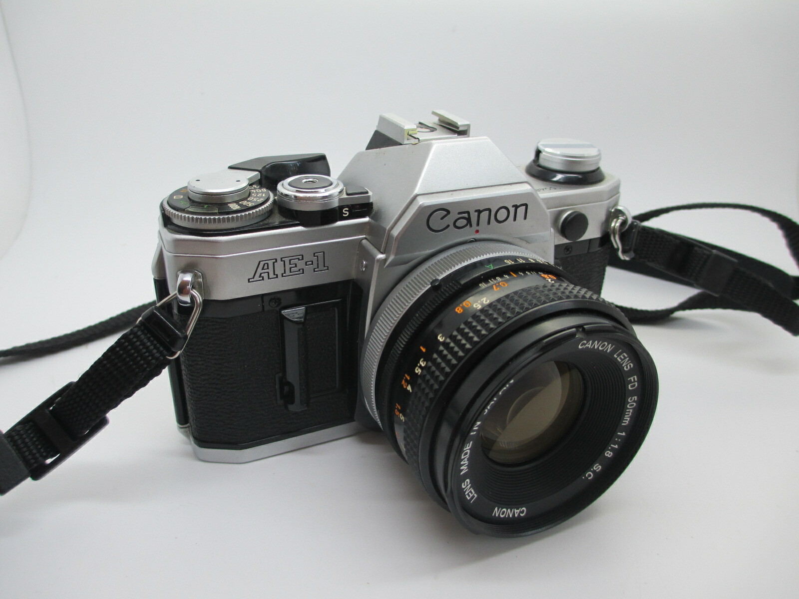 Canon AE-1 35mm SLR Film Camera with Canon 50mm f/1.8 FD Lens 