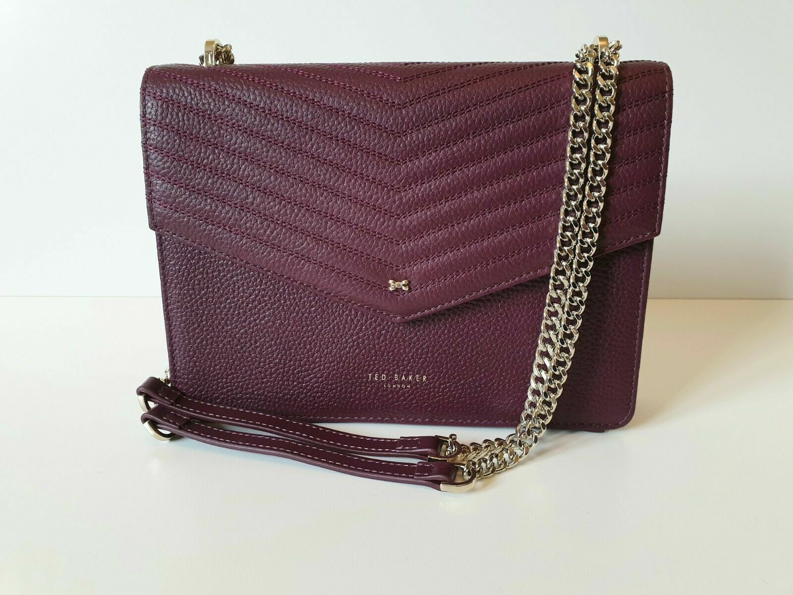 Ted Baker BNWT Maroon Crossbody Bag Kalila Chain detail leather. RRP 139