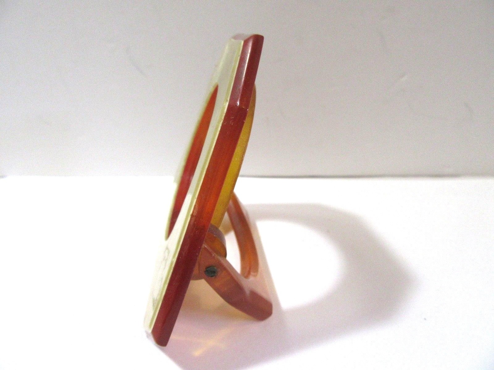 PINEAPPLE COLOR CELLULOID STANDING FRAME PART AS IS