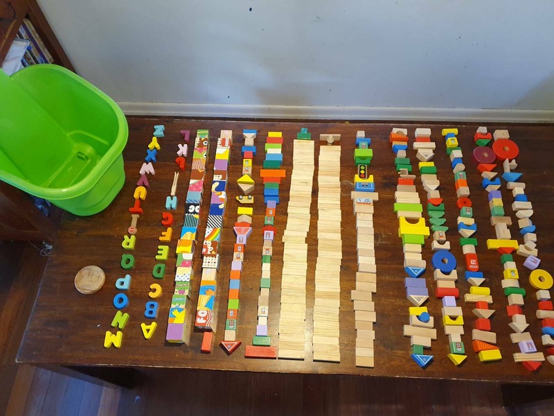 wooden building blocks in trolley