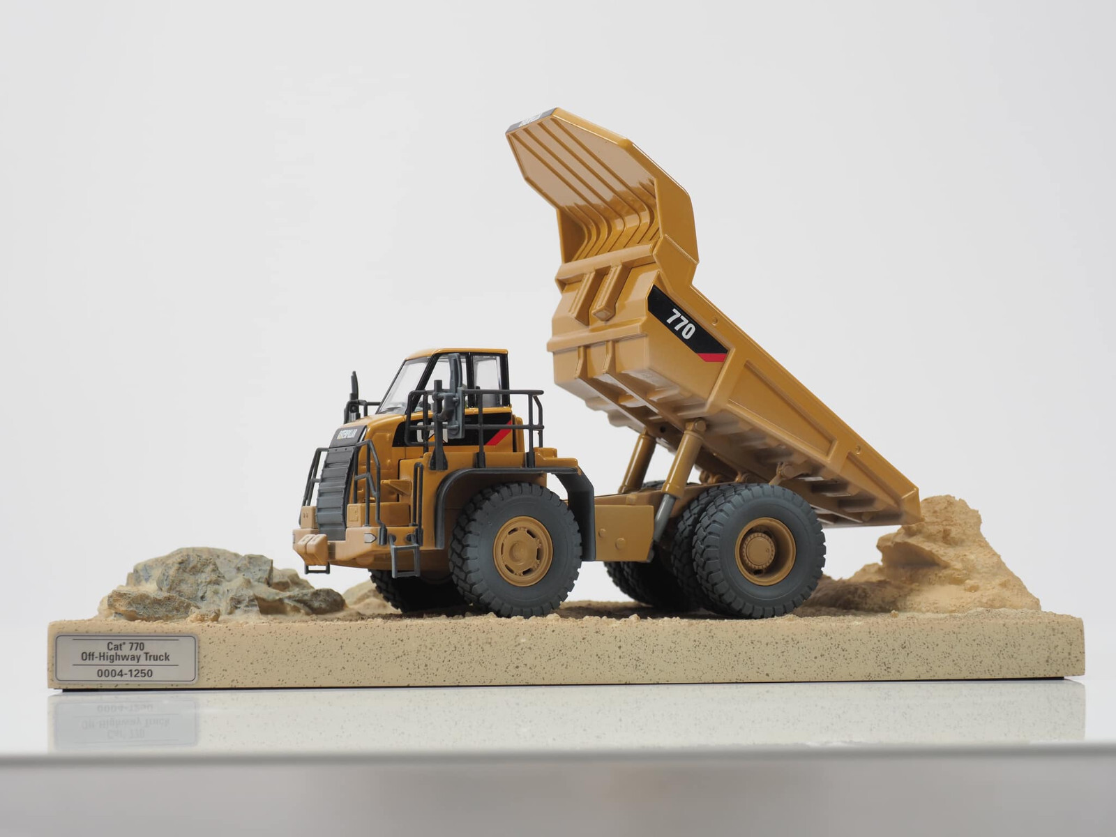 Diecast Masters 85756 CAT 770 Off-Highway Truck Weathered