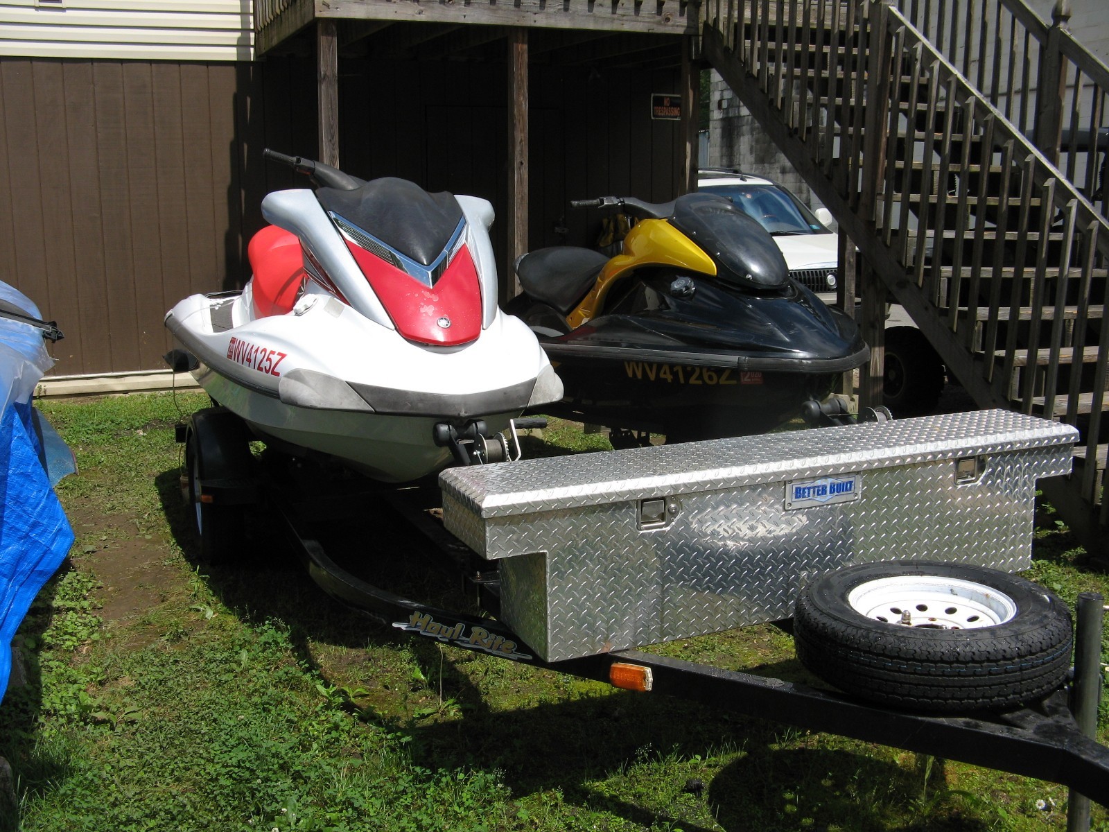 2- 2006 YAMAHA JETSKI AND TRAILER 48HOURS WHITE ONE 64HOURS BLACK ONE