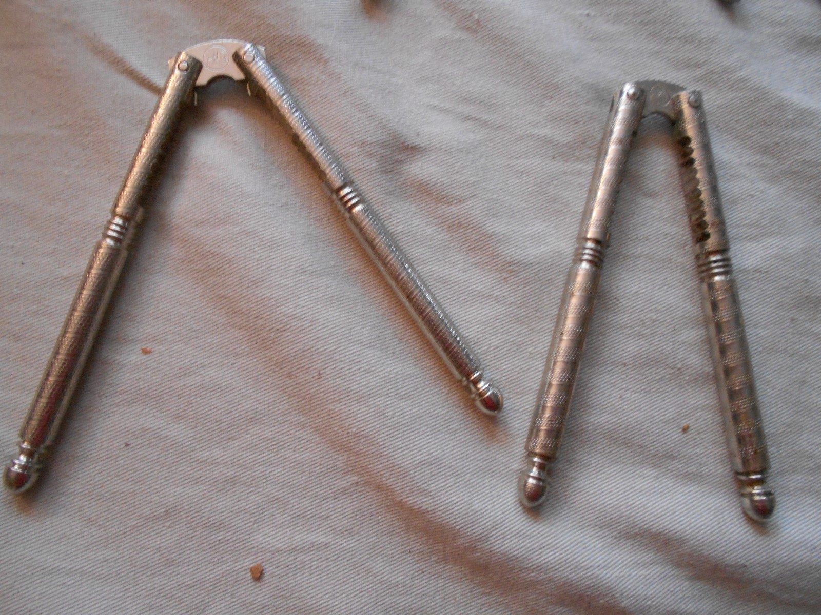 5 vintage steel HMQ nut crackers and 4 picks
