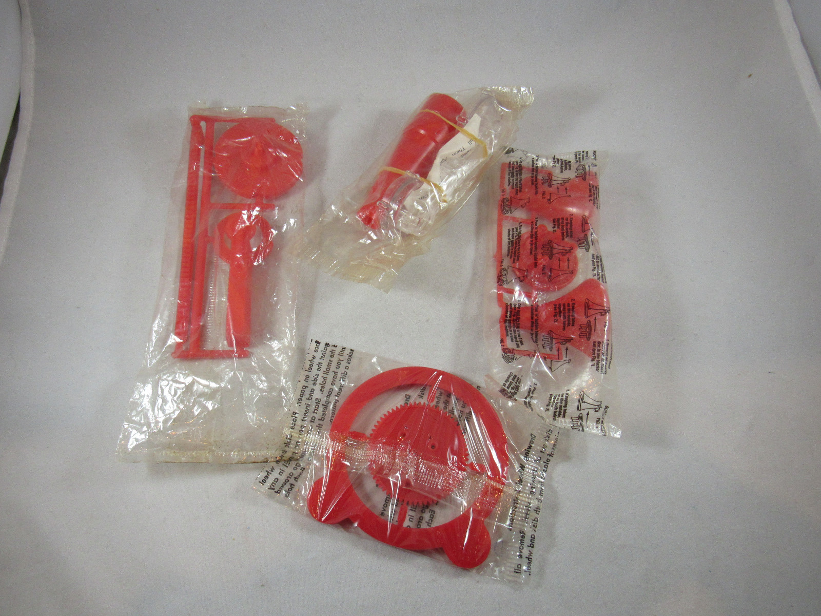 Cereal Premium Lot of 4 Assorted Red Toys in Sealed Bags Vintage Free Shipping