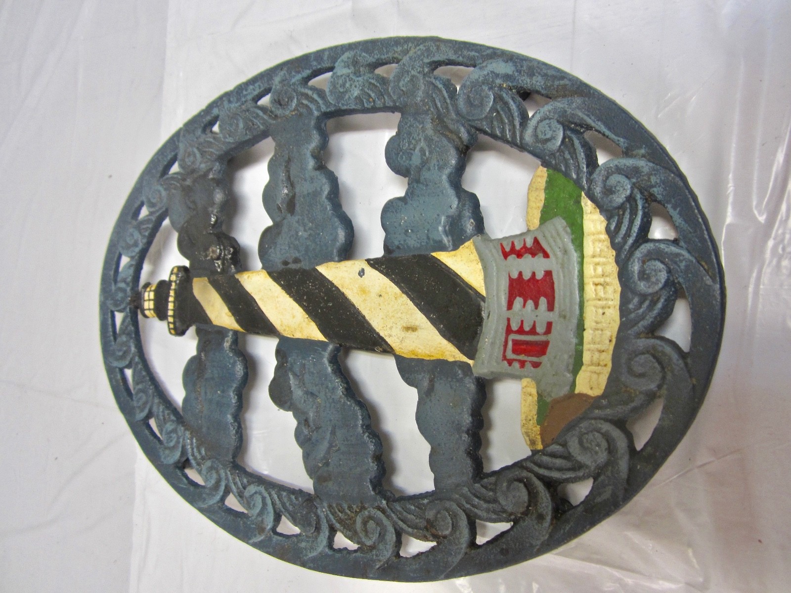 Vintage cast iron lighthouse trivet  9X7
