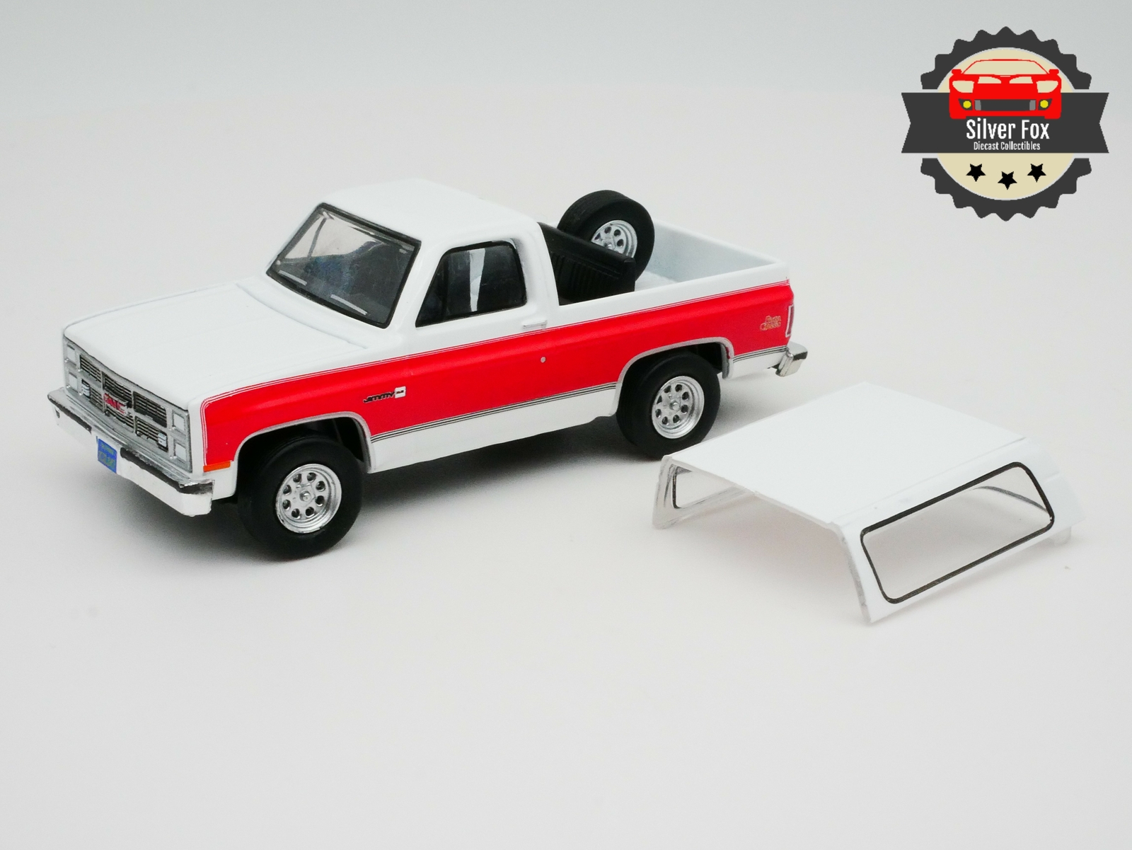 1983 GMC JIMMY SIERRA CLASSIC 4X4 WHITE 1:64 SCALE COLLECTOR DIECAST CAR