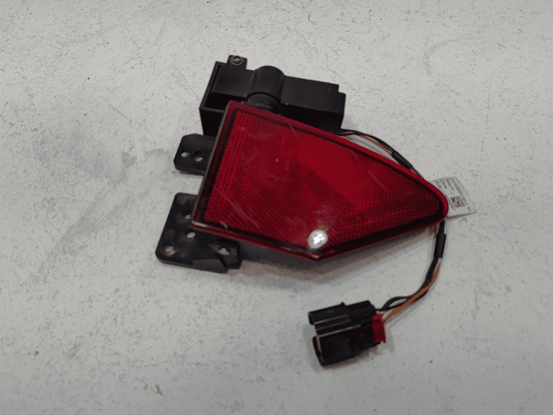 Used 2016-2020 Tesla Model S Rear Driver Side Taillight Charge Port Lid Reflector OEM