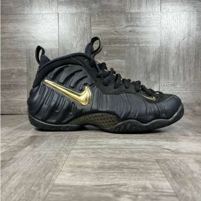 Foamposites black hotsell gold