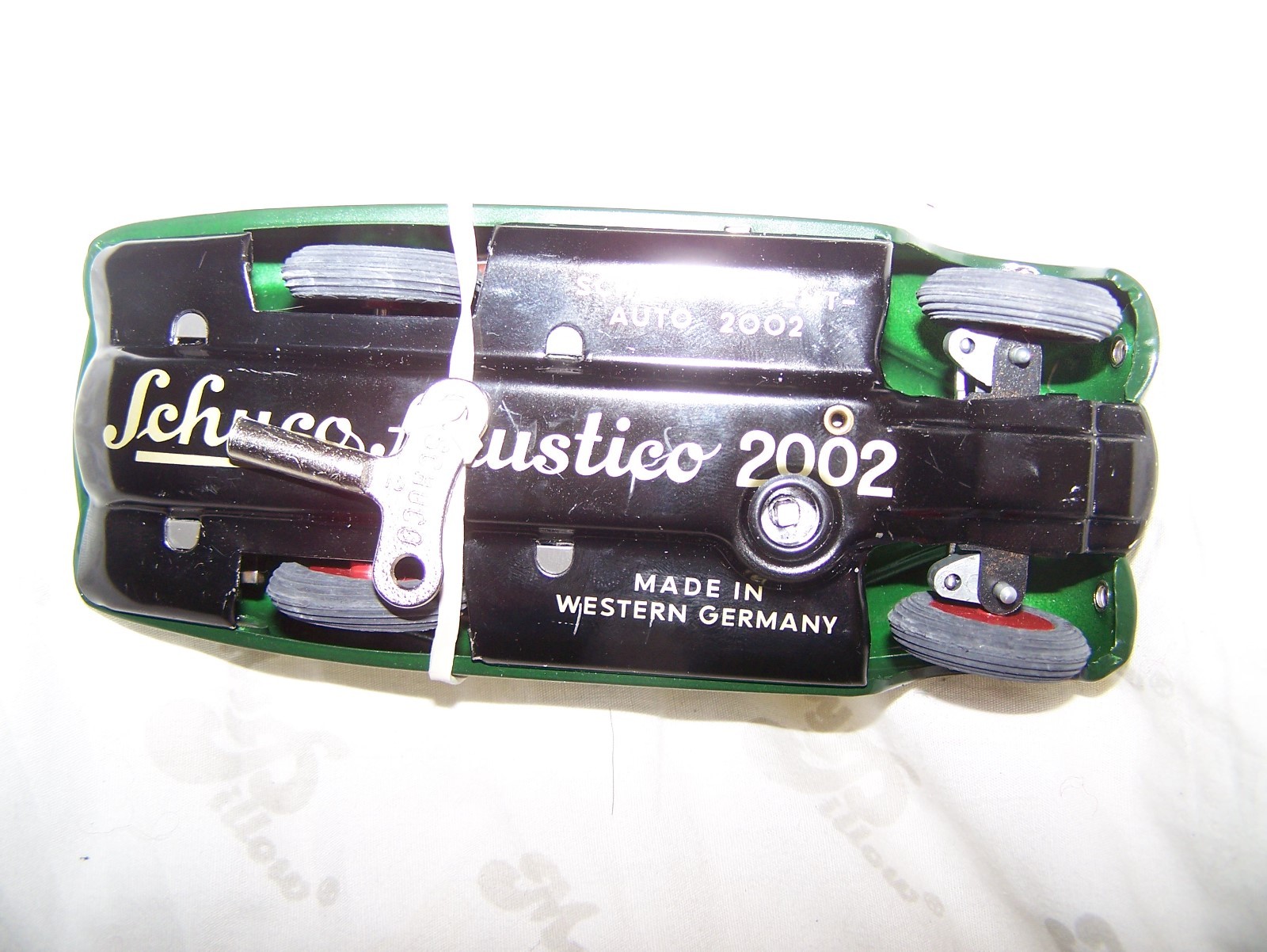 Schuco  Dark Green Akustico 2002 Tinplate/Wind-Up  NMIB