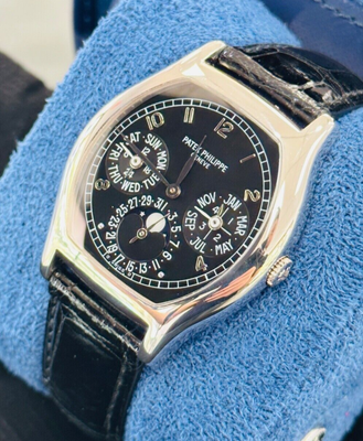 Patek philippe hotsell gold black