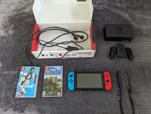 Nintendo Switch with Neon Blue and Neon Red Joy-Con With