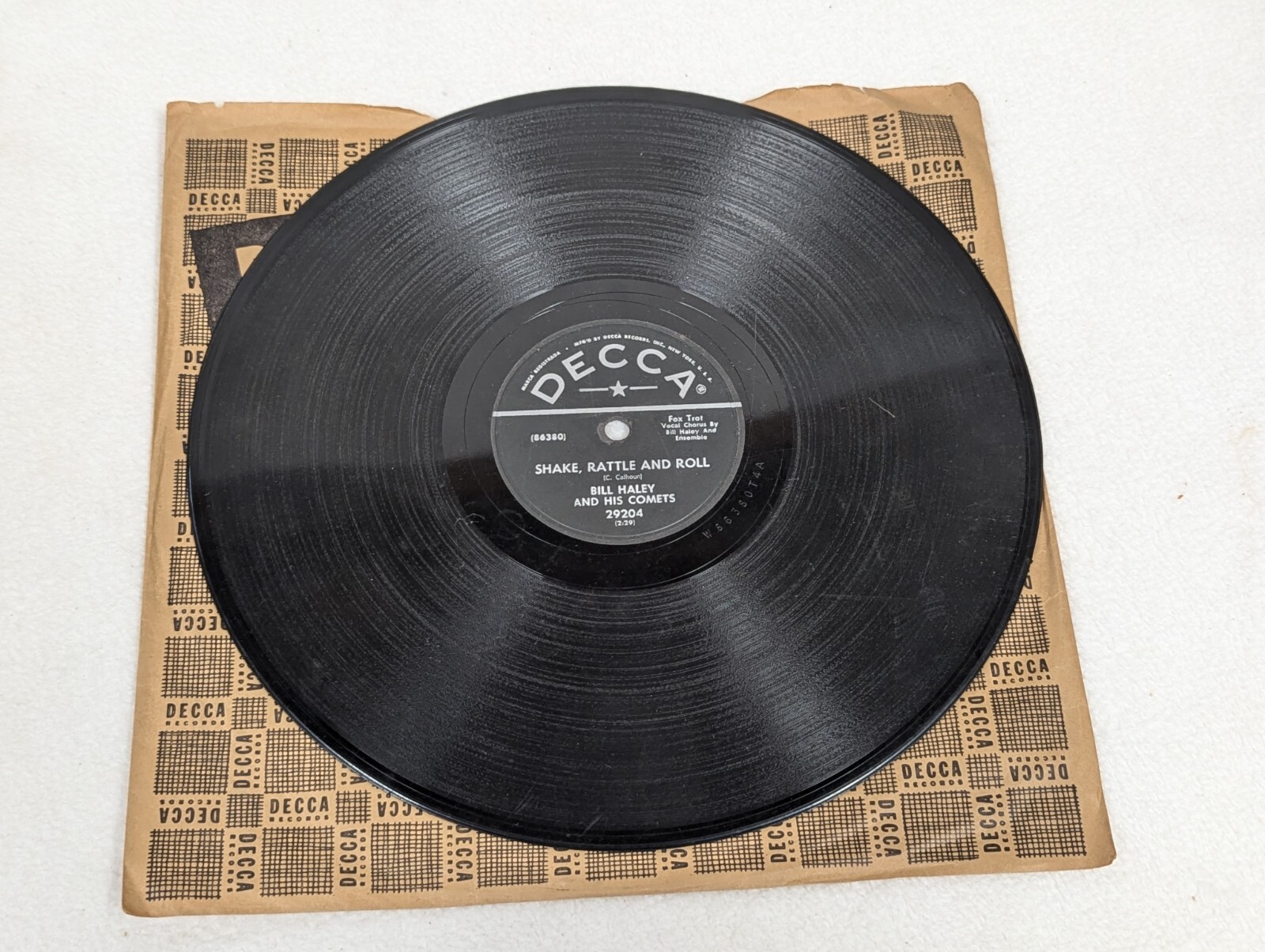 DJ 78 / Bidi – Action 78 / Rock Bo Diddley | Bo Diddley | Checker 78 rpm | 1955 USA - YouTube