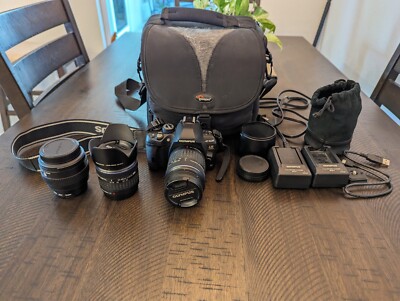 Olympus EVOLT E-620 with Zuiko 14-42mm, Zuiko 40-150mm, and Zuiko 50mm Macro