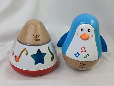 Hape Baby Toy Musical Windup Rotating Music Box Penguin Chime Ball