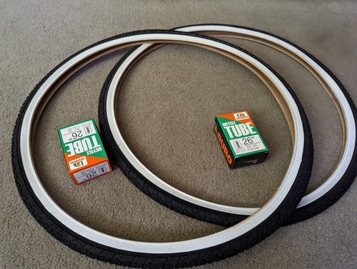 TWO (2) DURO BICYCLE TIRES 26X1&3/8 (37-590) WHITEWALLS & TUBES