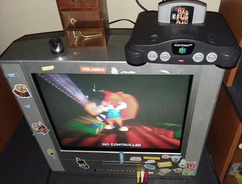 Nintendo 64 Console In Box with 2, oringal Controllers, and 3 games..