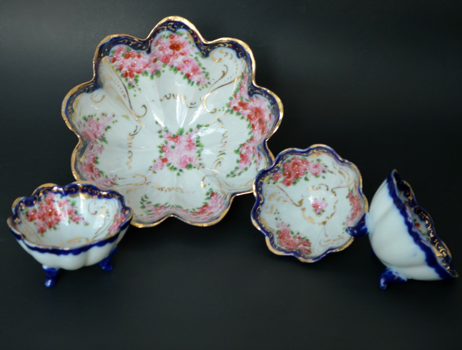 Set of 4 bowls Japan porcelain hand painted flow blue footed fruit nut dishes