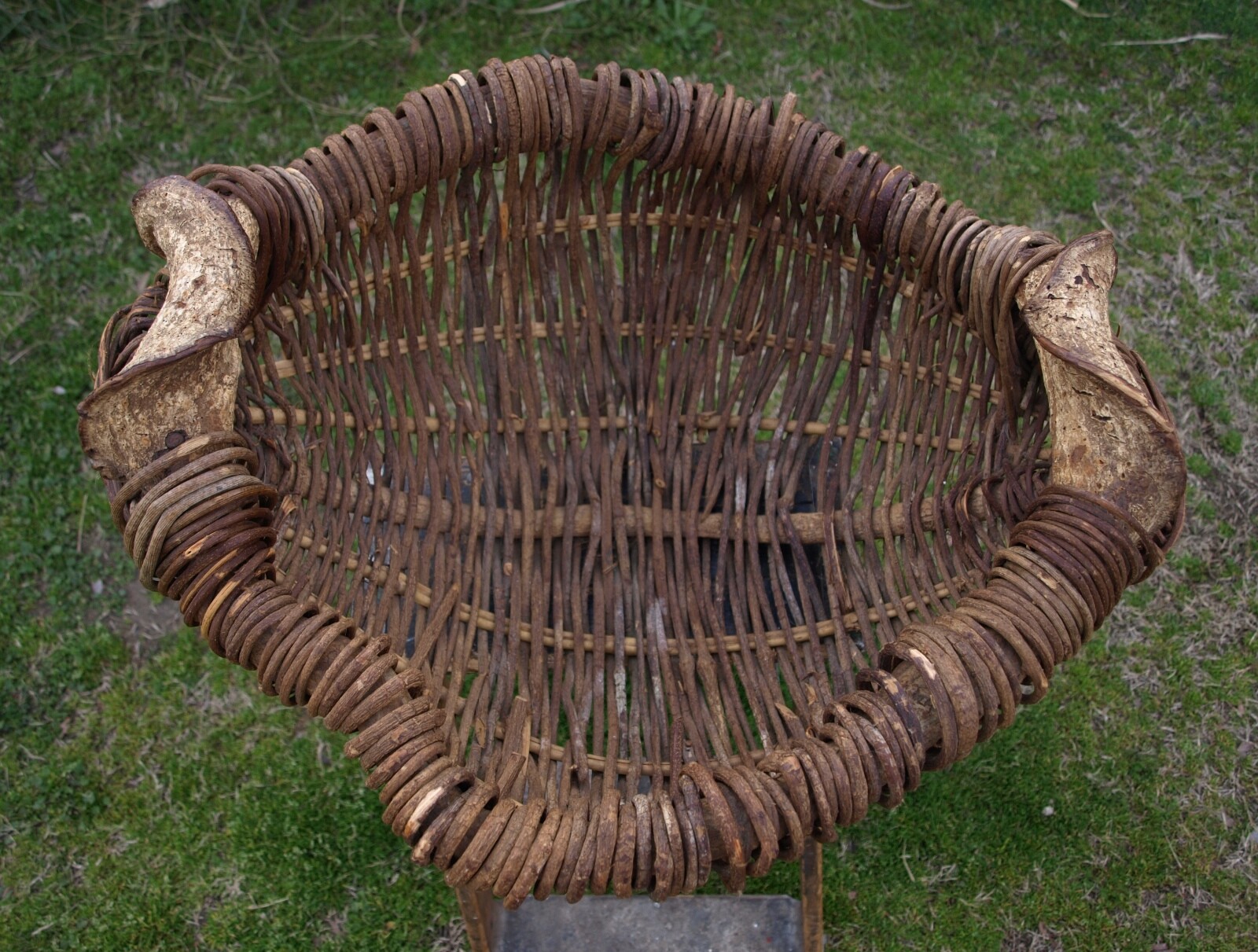 primitive gathering stick basket signed E.