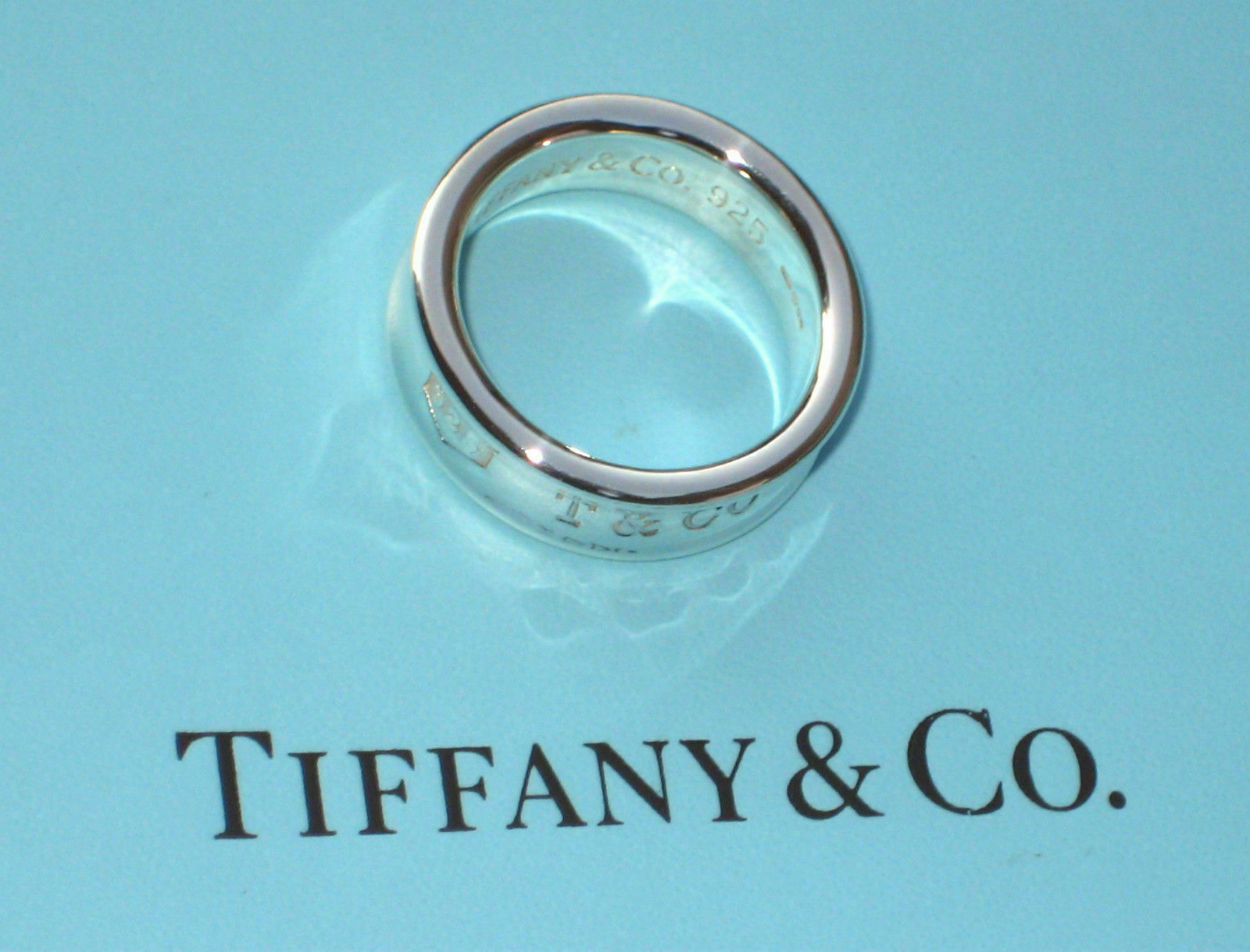 Tiffany & Co. Sterling Silver Size 5.25 Medium Width 7mm Tiffany & Co. Sterling Silver Size 5.25 Medium Width 7mm