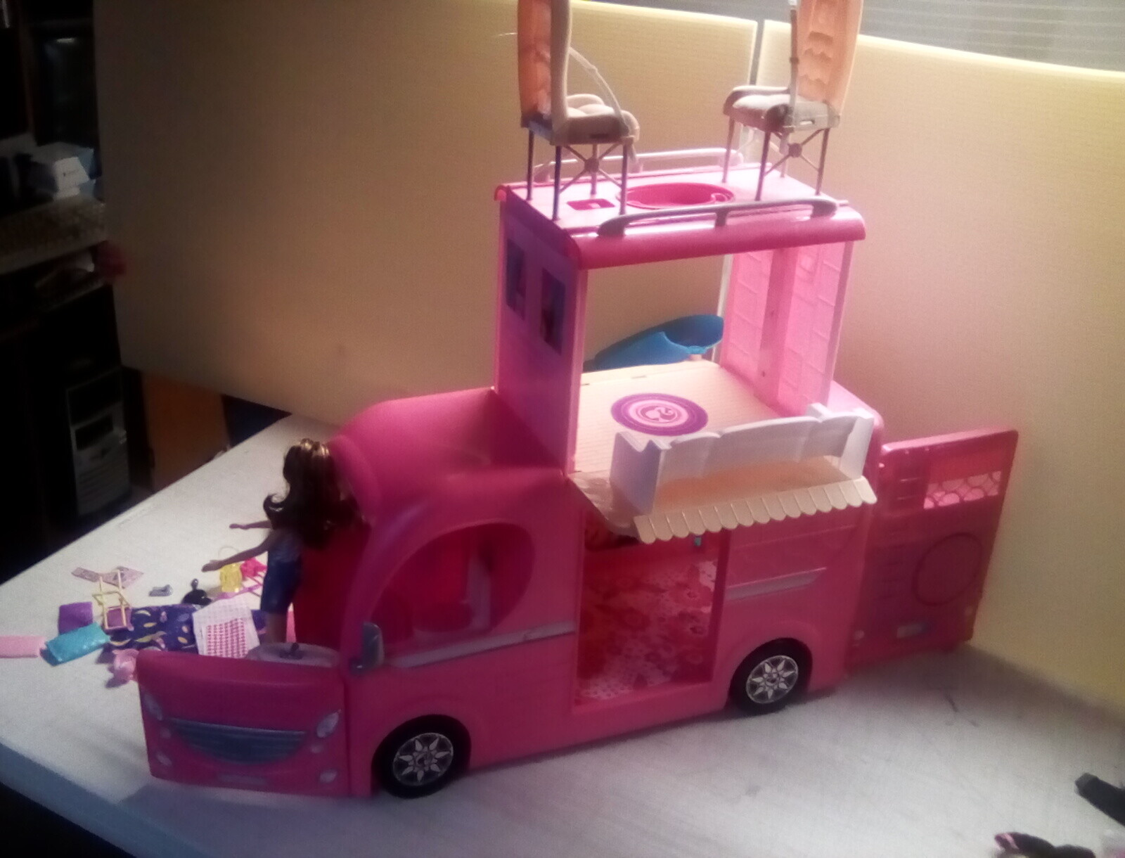 kid buys a giant barbie dream camper