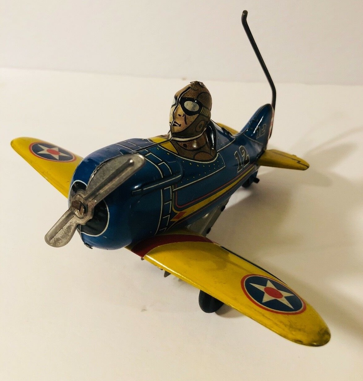 Excellent 1940's Marx Blue Tin Roll Over #12 Airplane with Pilot Windup