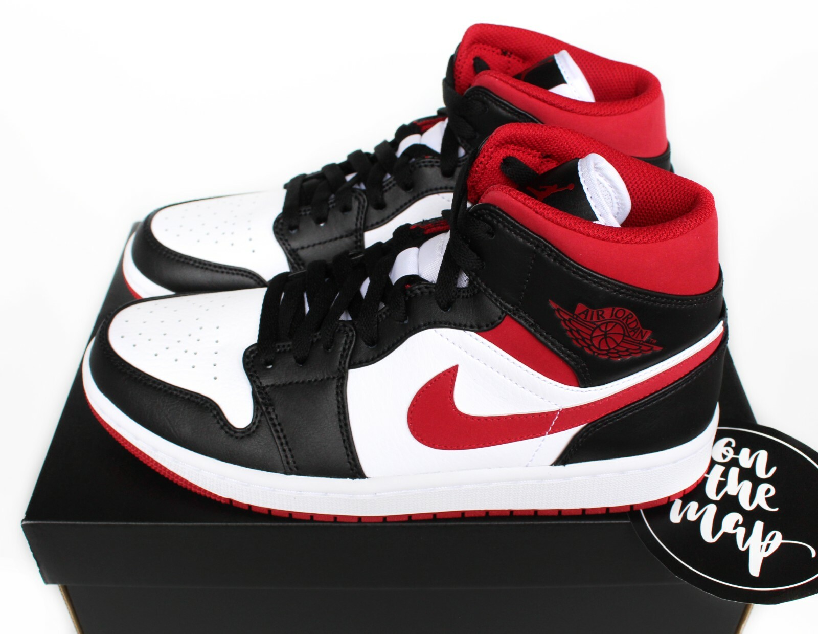 black & red air jordan 1 mid trainers junior