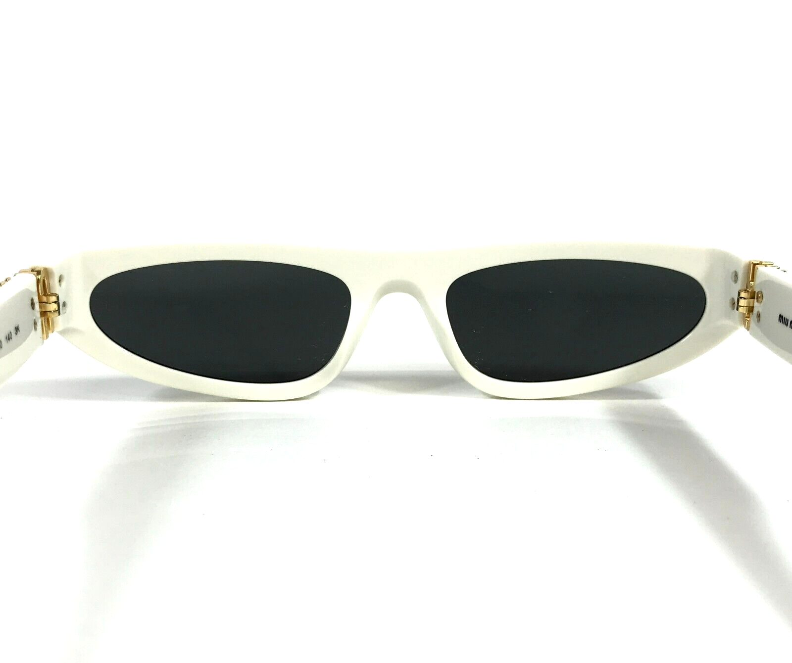 MIU MIU MIU MIU SUNGLASSES SMU07Z 142-5S0 WHITE IVORY GOLD FRAMES WITH DARK GREY LENSES