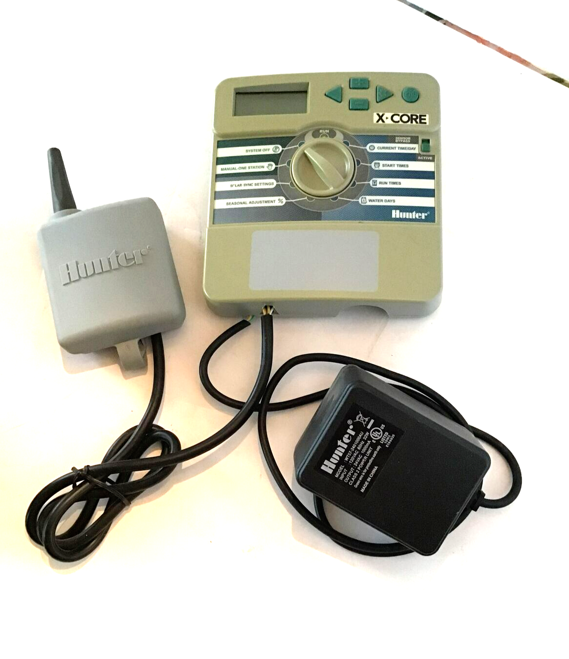 Hunter X-Core XC-800i Sprinkler Controller & WR-CLIK-R Weather Receiver Sensor.