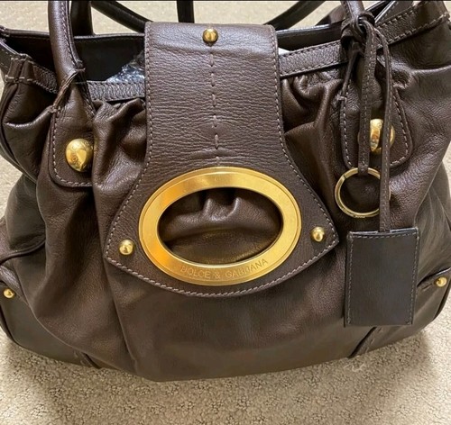DOLCE & GABBANA leather chocolate brown purse.Big Gold Logo