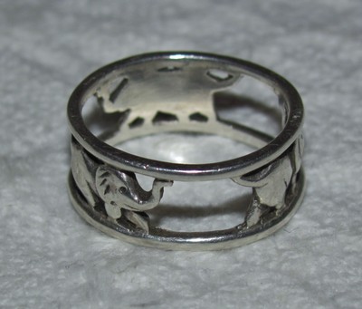 ELEPHANT LOVERS JEWELRY LOT: STERLING SILVER RING, PIN, CHARM BRACELET, EARRINGS