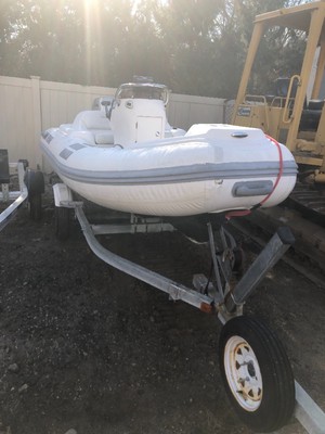 Caribe DL11 Rib Inflatable Honda