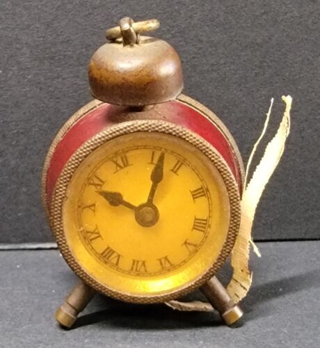 Antique Figural Alarm Clock Sewing Tape Measure in Red Celluloid Marked Germany