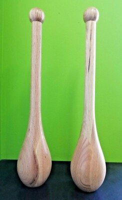 Oak Wood Tear Drop Indian Clubs Each club 1.4 lbs Sold in pairs 2.8 lbs shoulder