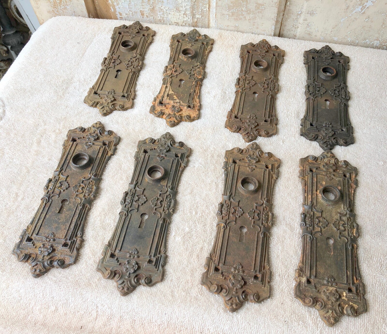 Lot of 8 Matching Antique Ornate Cast Iron Door Faceplates
