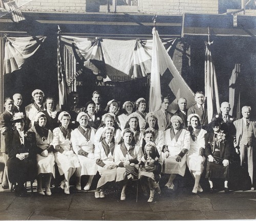 Red Cross Nurses & Men 1942 Flags in Front of Office World War II Vintage Photo