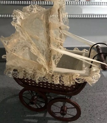 antique wooden baby stroller