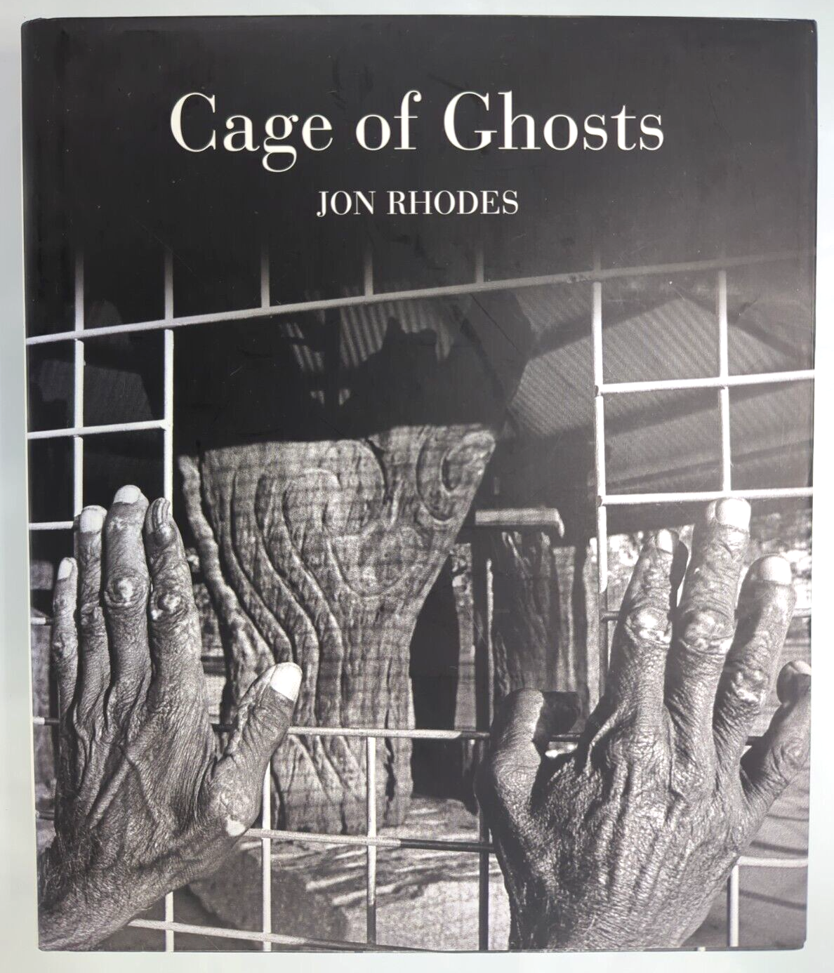 Cage Of Ghosts by Jon Rhodes