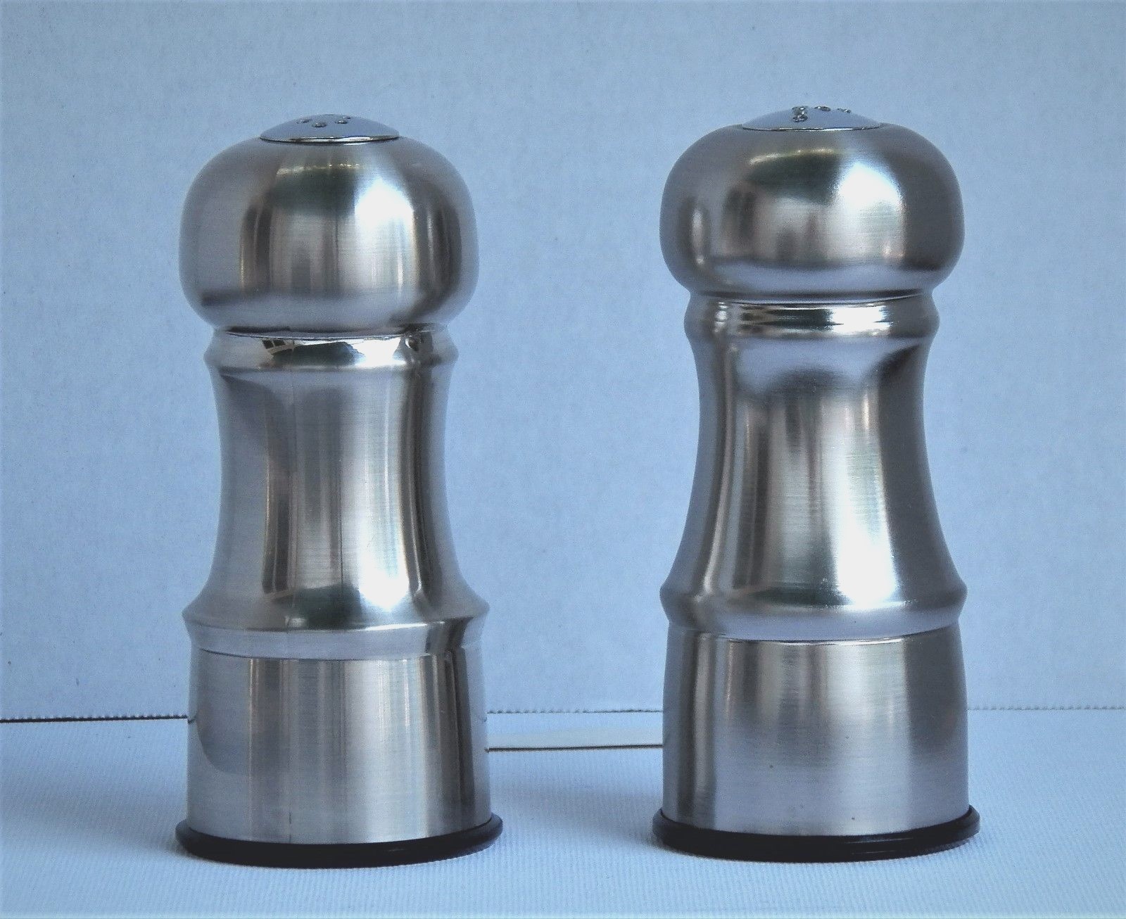 EXCELLENT PAIR OF TRUDEAU 4½ INCH TALL STAINLESS STEEL SALT AND PEPPER SHAKERS