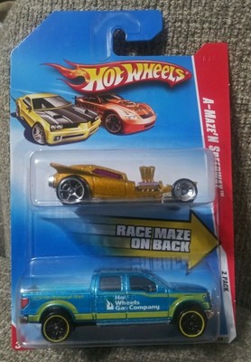 2010 Hot Wheels TARGET EXCLUSIVE 2 PACK   FANGULA & 2009 FORD F150   GAS COMPANY