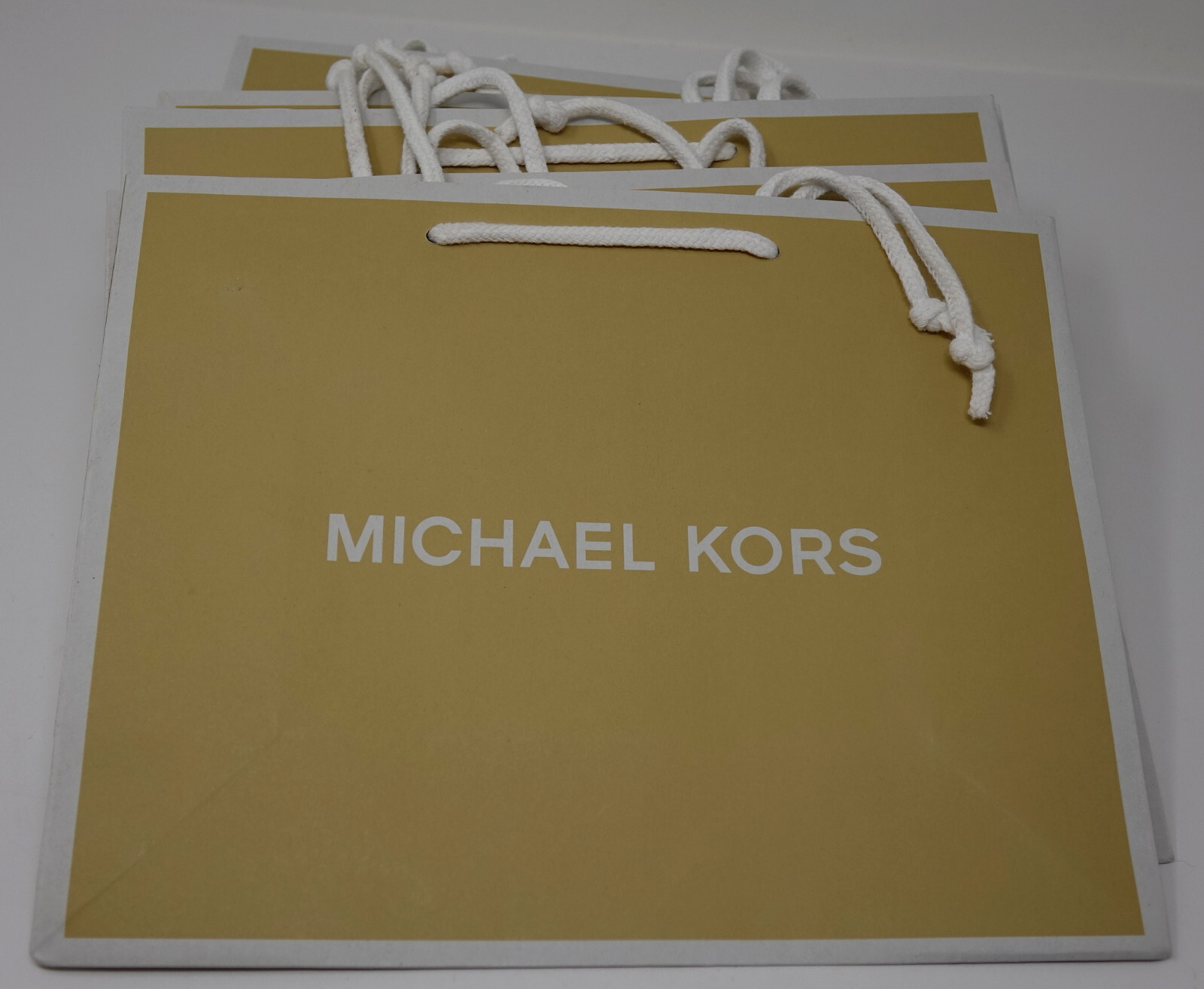 Новый подарочный бумажный пакет для покупок с логотипом MICHAEL KORS размером 10 X 8 X 4