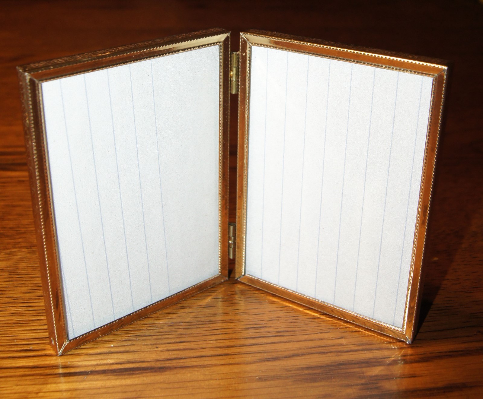 Set of 3 Gold Picture Frames, each hold 2 Pictures