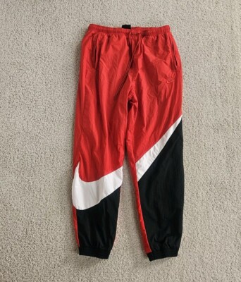 Nike big swoosh track pants hotsell