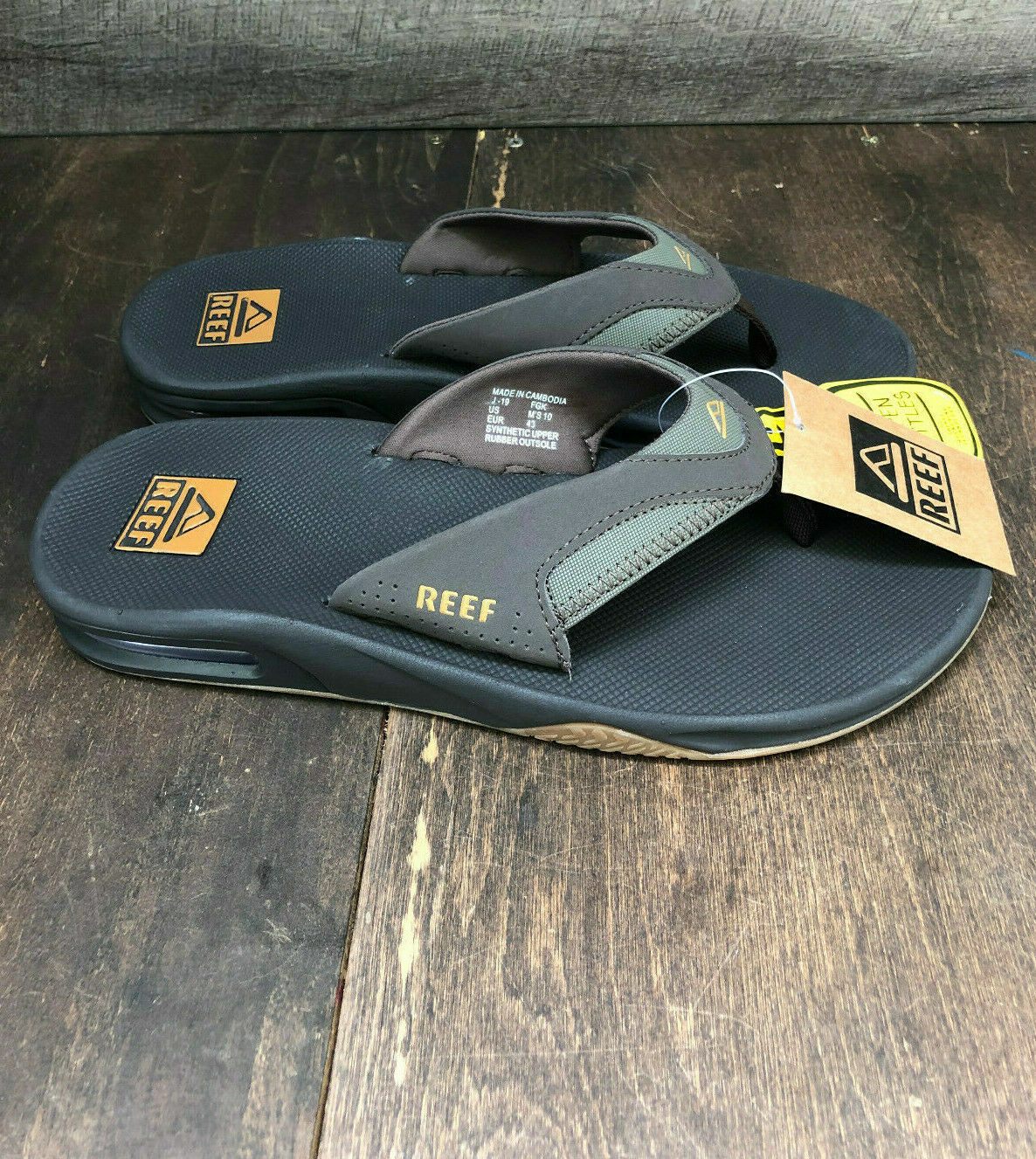 mens reef sandals bottle opener