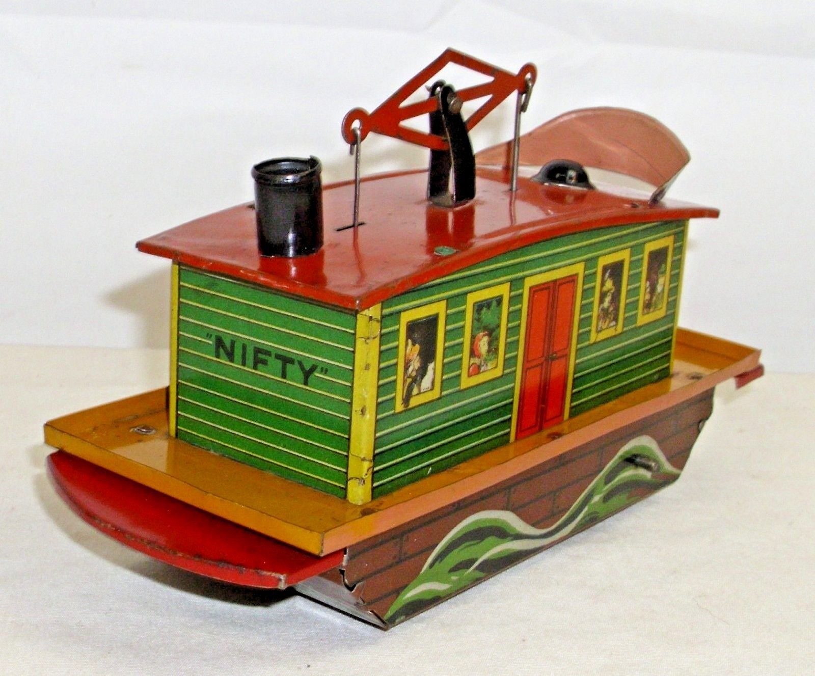 NIFTY FERRY BOAT GERMANY TIN WIND UP LITHO COMIC CHARACTER TOY 1920s